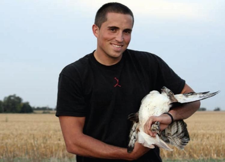 student aiding a falcon